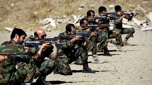 Fighters from Iran's Basij volunteer militia training (Photo: AP/Archive)