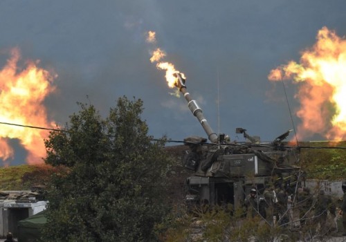 An IDF artillery gun fires a shell into Lebanon, after a roadside bomb exploded next to an IDF military border patrol near the Sheba Farms area near Kiryat Shmona, Israel, January 4, 2016.. (photo credit:REUTERS)