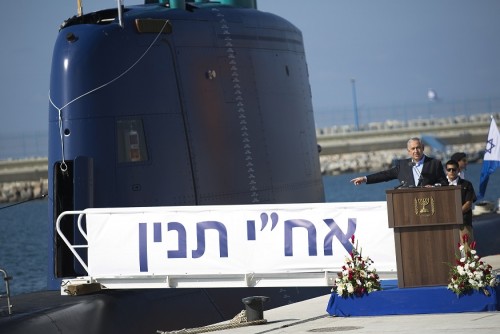 Israel's Prime Minister Benjamin Netanyahu speaks during a ceremony following the arrival of the INS Tanin, a Dolphin AIP class submarine, to a naval base in the northern city of Haifa, Israel, Tuesday, September 23, 2014. Tanin is the fourth submarine Israel has acquired, and is the first of three German-built Dolphin AIP class vessels ordered by Israel, an Israeli Defence Forces spokesperson said on Tuesday. (AP Photo/Amir Cohen, Pool)