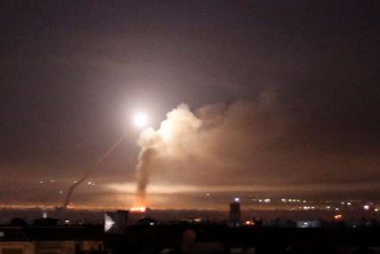 Missile fire is seen from Damascus