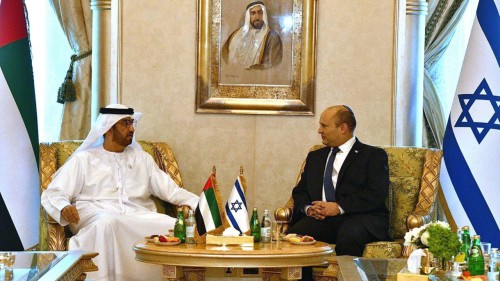 Israeli Prime Minister Naftali Bennett, right, meets with UAE Minister of Industry and Advanced Technology Dr. Sultan bin Ahmed Al Jaber, in Abu Dhabi, United Arab Emirates, Monday, Dec. 13, 2021. Acording to the Goverment Press Office they discussed cooperation between the two countries in technology, trade and energy, especially projects in the field of renewable energy. Bennett returned home from a two-day trip to the UAE — the first official visit to the Gulf country by an Israeli leader since the countries established relations last year. (Haim Zach/Israel Government Press Office via AP)/CAITH106/21347603367651/AP PROVIDES ACCESS TO THIS PUBLICLY DISTRIBUTED HANDOUT PHOTO PROVIDED BY ISRAEL GOVERNMENT PRESS OFFICE; MANDATORY CREDIT. BEST QUALITY AVAILABLE./2112131820