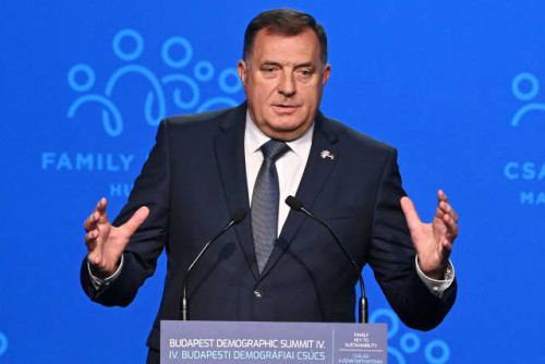 Chairman of the Presidency of Bosnia and Herzegovina Milorad Dodik gives a speech on the stage of the Varkert Bazar cultural centre in Budapest on September 23, 2021 during the fourth demographic summit. - The meeting is a platform for decision-makers, political players, religious and civic leaders, economic and media actors, as well as representatives of the academic world to think together, discuss the challenges ahead of us and draw up proposals for common solutions. (Photo by ATTILA KISBENEDEK / AFP)
