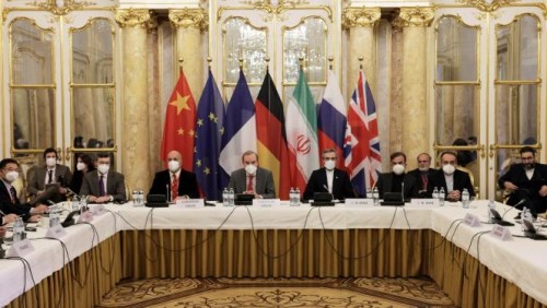 Deputy Secretary General of the European External Action Service (EEAS) Enrique Mora and Iran's chief nuclear negotiator Ali Bagheri Kani and delegations wait for the start of a meeting of the JCPOA Joint Commission in Vienna, Austria December 17, 2021. EU Delegation in Vienna/EEAS/Handout via REUTERS ATTENTION EDITORS - THIS PICTURE WAS PROVIDED BY A THIRD PARTY