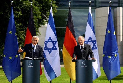 Israeli Prime Minister Yair Lapid and German Chancellor Olaf Scholz address the media at the Chancellery in Berlin, Germany, September 12, 2022. REUTERS/Christian Mang