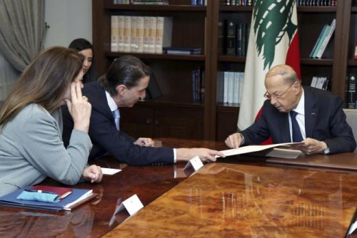 In this photo released by Lebanon's official government photographer Dalati Nohra, Lebanese President Michel Aoun, right, meets with U.S. Envoy for Energy Affairs Amos Hochstein, center left, at the presidential palace, in Baabda, east of Beirut, Lebanon, Tuesday, June 14, 2022. Hochstein, the U.S. envoy mediating between Lebanon and Israel over their disputed maritime border, met Aoun for talks on ways of reaching a solution amid rising tensions along the tense border. (Dalati Nohra via AP)