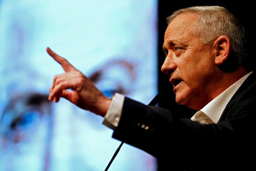 FILE PHOTO: Benny Gantz, leader of Blue and White party, speaks during an election campaign rally in Ramat Gan, near Tel Aviv, Israel, February 25, 2020. REUTERS/Corinna Kern//File Photo