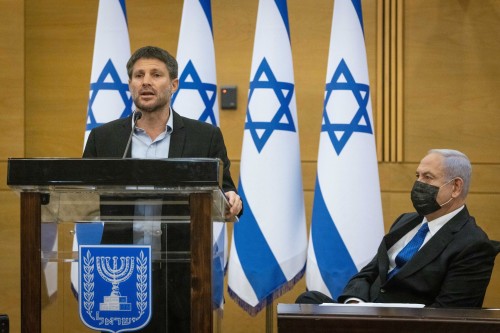 Head of the Religious Zionist Party MK Bezalel Smotrich speaks next to Head of opposition Benjamin Netanyahu during a meeting with the opposition parties at the Knesset, the Israeli parliament, on June 28, 2021. Photo by Yonatan Sindel/Flash90 *** Local Caption *** àåôåæéöéä ëðñú ôâéùä âåù éîéï áðéîéï ðúðéäå