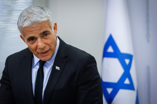 Israeli foreign minister and Head of the Yesh Atid party Yair Lapid speaks during a faction meeting at the Knesset, the Israeli parliament in Jerusalem, on November 8, 2021. Photo by Oliiver Fitoussi/Flash90 *** Local Caption *** יאיר לפיד יש עתיד סיעה כנסת