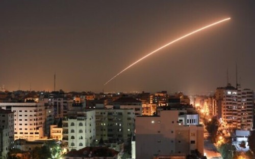 Israeli missile launched from the Iron Dome defence missile system, designed to intercept and destroy incoming short-range rockets and artillery shells, is seen above Gaza city on November 12, 2019. (Photo by BASHAR TALEB / AFP)