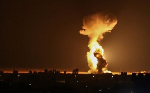 Smoke and flames rise after war planes belonging to the Israeli army carried out airstrikes over the southern Gaza Strip city of Rafah on August 12, 2020. (Photo by SAID KHATIB / AFP)