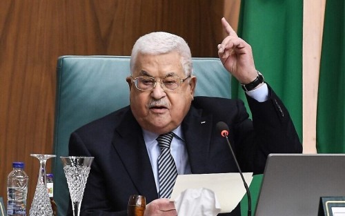 Palestinian President Mahmud Abbas speaks during the Arab League's "Summit for Jerusalem" in Cairo, on February 12, 2023. (Photo by Ahmad HASSAN / AFP)