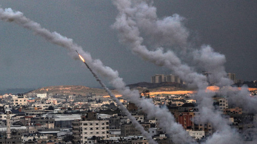 Mandatory Credit: Photo by MOHAMMED SABER/EPA-EFE/Shutterstock (10565953d) Rockets fired from Gaza fly towards Israel, in Gaza City, 24 February 2020. According to media reports, Islamic Jihad fired several rockets and mortars from Gaza towards Israel on 24 February, a day after several projectiles were also fired and Israel responded by strikes against targets in Gaza and near Damascus. Tension between Gaza and Israel - 24 Feb 2020