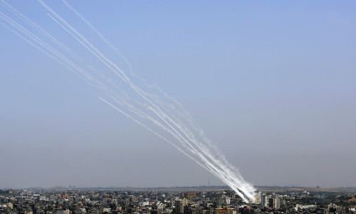 Rockets are launched from Gaza Strip towards Israel, Tuesday, May 11, 2021. (AP Photo/Hatem Moussa)