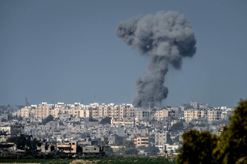 A view from Sderot, Israel, of a smoke plume as a shelling hits in Beit Hanoun, in the northeastern corner of the Gaza Strip, Oct 19, 2023. The Israeli bombardment of the Gaza Strip, in retaliation for a deadly Hamas attack on southern Israel, has brought a new outpouring of support in the Arab world for the Palestinian quest for a state. (Sergey Ponomarev/The New York Times)
