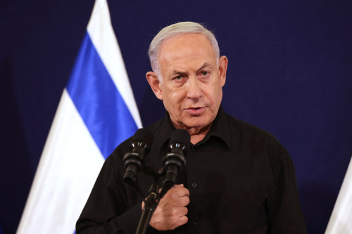 Israeli Prime Minister Benjamin Netanyahu speaks during a press conference in the Kirya military base in Tel Aviv on October 28, 2023 amid ongoing battles between Israel and the Palestinian group Hamas. Netanyahu said on October 28 that fighting inside the Gaza Strip would be "long and difficult", as Israeli ground forces operate in the Palestinian territory for more than 24 hours. (Photo by Abir SULTAN / POOL / AFP) (Photo by ABIR SULTAN/POOL/AFP via Getty Images)