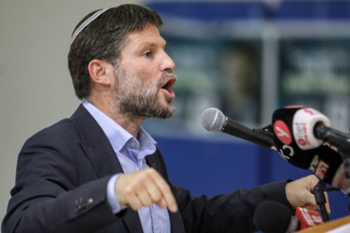 Bezalel Smotrich, Israeli far-right lawmaker and leader of the Religious Zionist Party, speaks during a rally with supporters in the southern Israeli city of Sderot on October 26, 2022. (Photo by GIL COHEN-MAGEN / AFP)