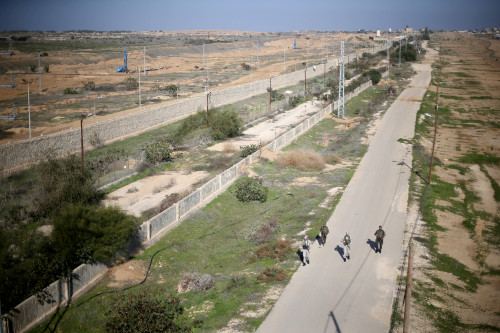 Palestinian security forces loyal to Hamas patrol near the border between Egypt and Gaza, in the southern Gaza Strip January 14, 2018. REUTERS/Ibraheem Abu Mustafa