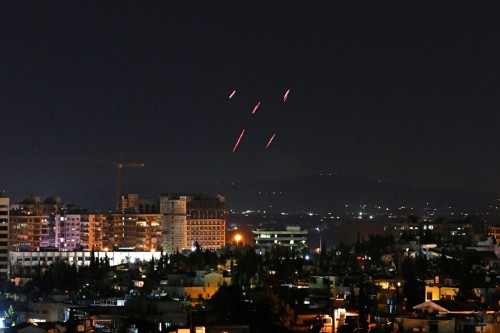 Syrian Air defences respond to Israeli missiles targeting south of the capital Damascus, on July 20, 2020. - Israeli strikes south of the Syrian capital wounded seven Syrian soldiers, state media reported, in an attack which a war monitor said hit several positions of regime forces and Iran-backed militias. (Photo by STR / AFP) (Photo by STR/AFP via Getty Images)