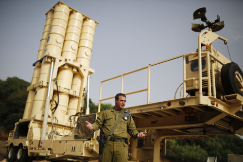 Colonel Zvika Haimovich of the Israeli air defence corps stands in front of an Arrow II battery, a U.S.-backed Israeli missile shield, during an interview with Reuters at his base in Palmachim, south of Tel Aviv May 29, 2013.  Israel tracks every heavy missile fired in the Syrian civil war, keen to study Damascus's combat doctrines and deployments and ready to fend off a feared first attack on its turf, Haimovich said on Thursday. To match Interview: SYRIA-CRISIS/ISRAEL-MISSILES   Picture taken May 29, 2013. REUTERS/Amir Cohen (ISRAEL - Tags: MILITARY POLITICS CIVIL UNREST)