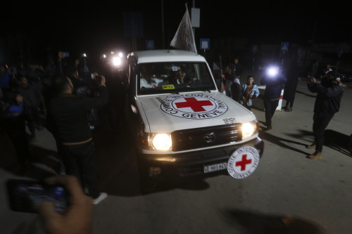 ARed Cross convoy carrying Israeli hostages heads to Egypt from the Gaza Strip in Rafah during a temporary ceasefire between Israel and Hamas on Wednesday, Nov. 29, 2023. (AP Photo/Hatem Ali)