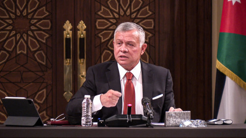 (FILES) In this file handout picture released by the Jordanian Royal Palace on March 23, 2021, Jordanian King Abdullah II speaks during a meeting at the House of Representatives in the capital Amman. - Jordan's King Abdullah broke his silence on April 7, 2021 to tell his nation that the worst political crisis in decades sparked by an alleged plot involving his half-brother Prince Hamzah was over. "I assure you, that the sedition has been nipped in the bud," Abdullah said in address read out in his name on state television. (Photo by - / Jordanian Royal Palace / AFP) / RESTRICTED TO EDITORIAL USE - MANDATORY CREDIT "AFP PHOTO / JORDANIAN ROYAL PALACE / YOUSEF ALLAN" - NO MARKETING NO ADVERTISING CAMPAIGNS - DISTRIBUTED AS A SERVICE TO CLIENTS