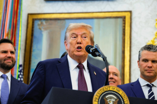 U.S. President Donald Trump, next to Vice President JD Vance and Secretary of Defense Pete Hegseth, speaks during an event to announce that the Space Force Command will move from Colorado to Alabama, in the Oval Office at the White House in Washington, D.C., U.S., September 2, 2025. REUTERS/Brian Snyder